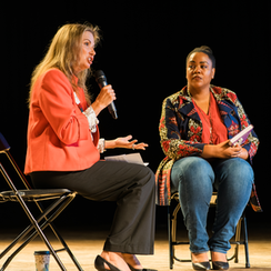 Two women on stage