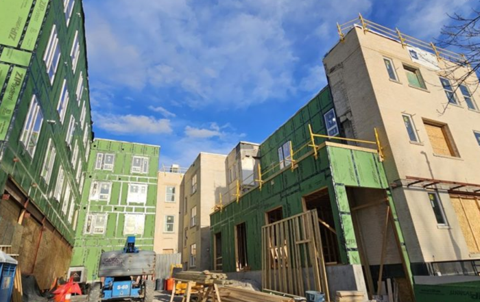 Residential construction site with multi-story buildings under construction