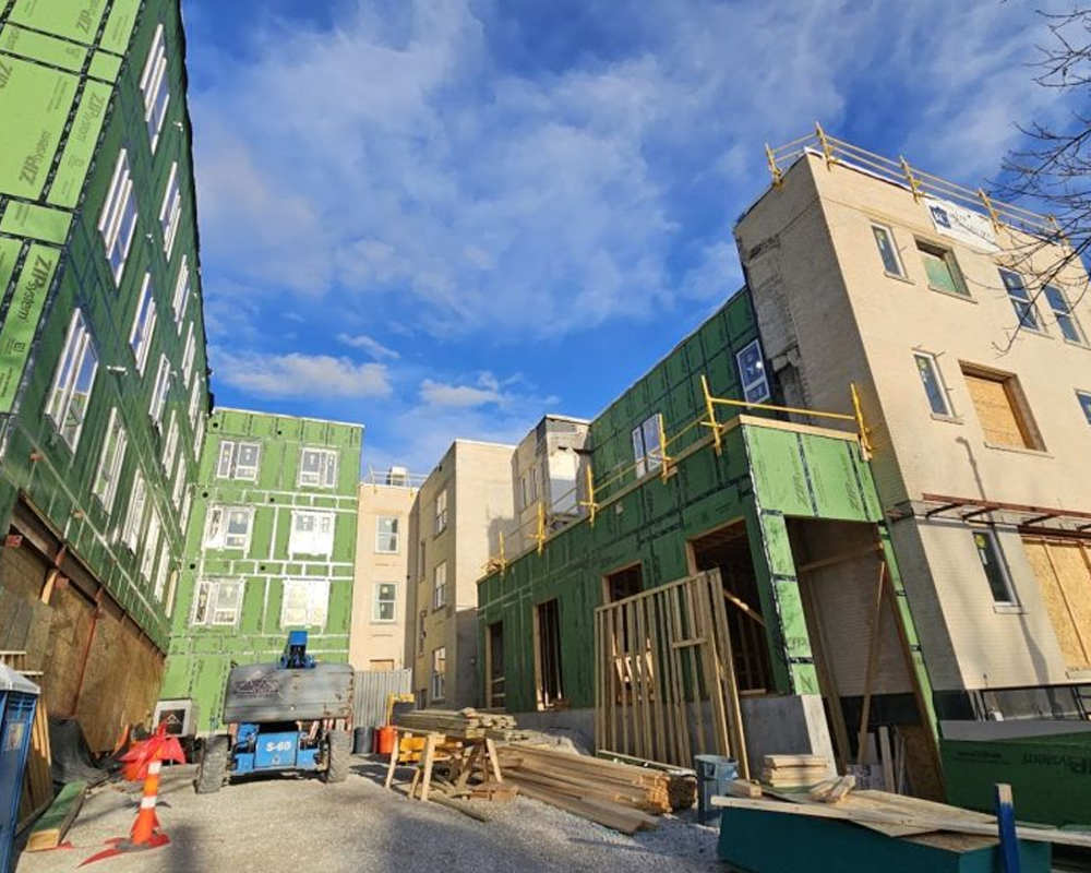 Residential construction site with multi-story buildings under construction