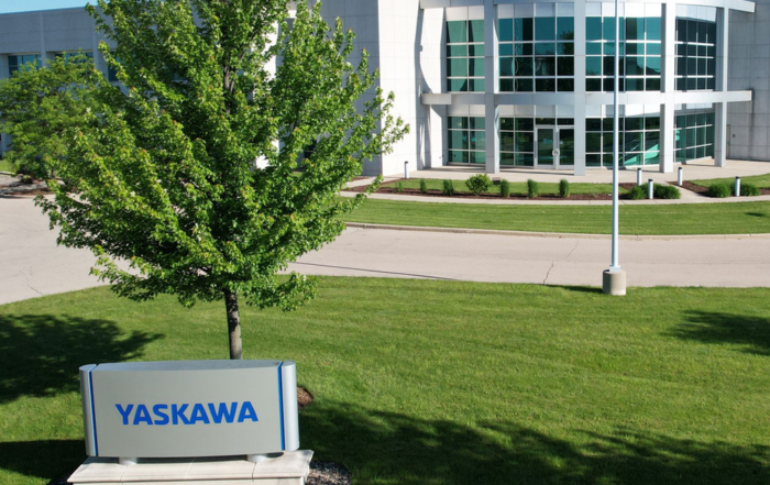 Yaskawa company headquarters exterior showing white and gray building with large windows