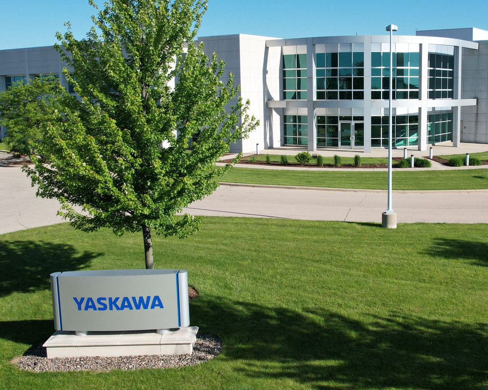 Yaskawa company headquarters exterior showing white and gray building with large windows